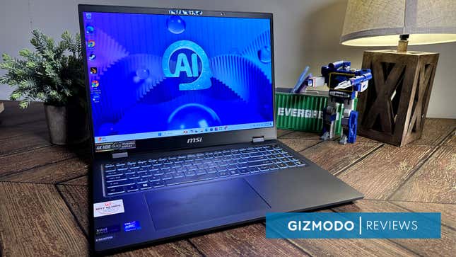 A MSI Prestige 16 AI EVO laptop surrounded by desk toys and a lamp.